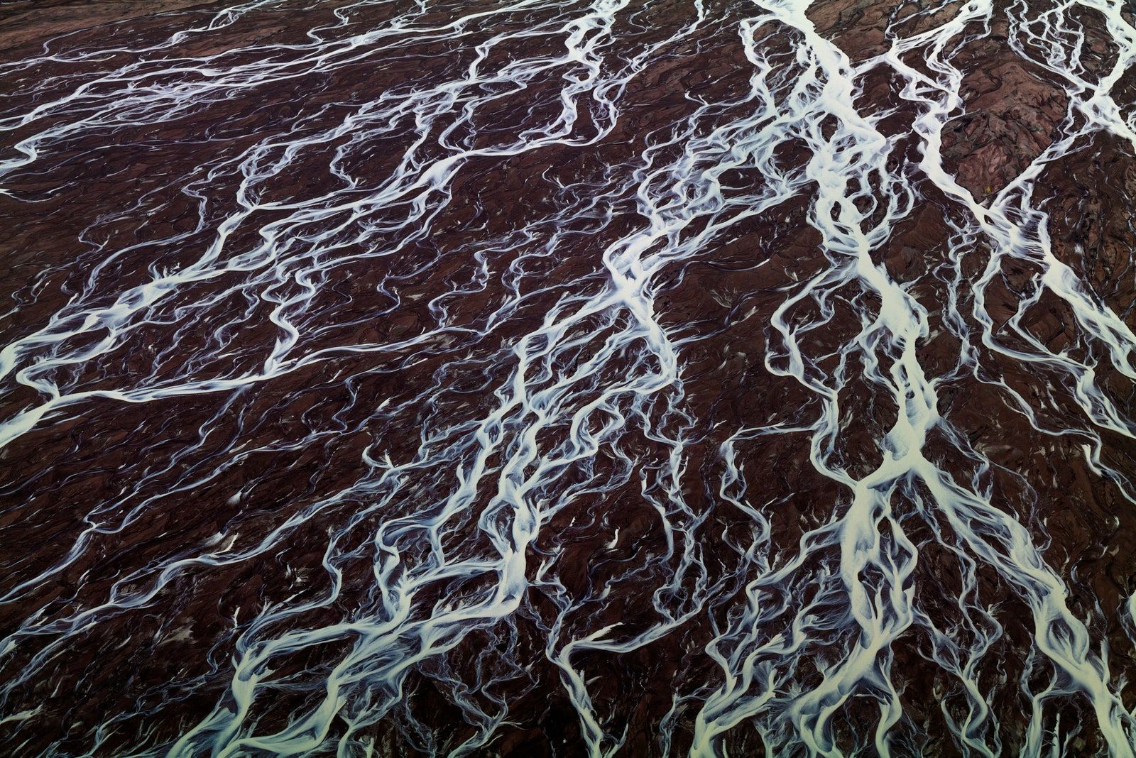 Meltwater streaming from the Russell Glacier eventually makes its way into the North Atlantic. Meltwater streaming from the Russell Glacier eventually makes its way into the North Atlantic.